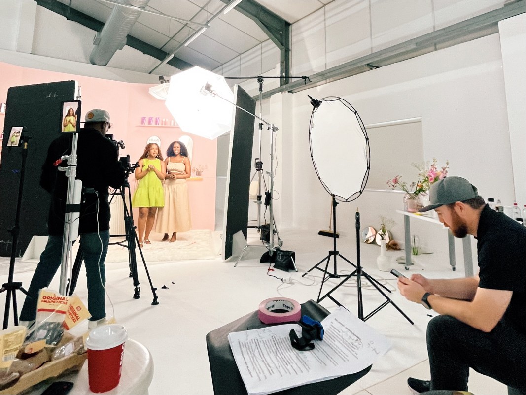 Rolling on the pink cyc for a beauty shoot